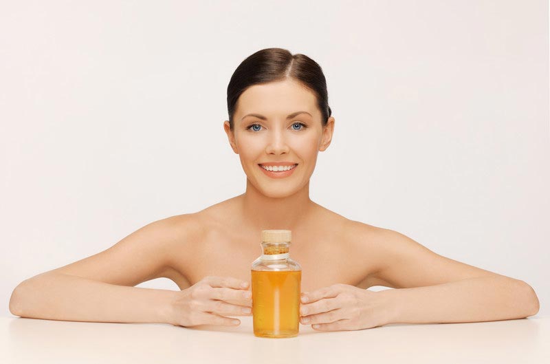 woman-with-olive-oil